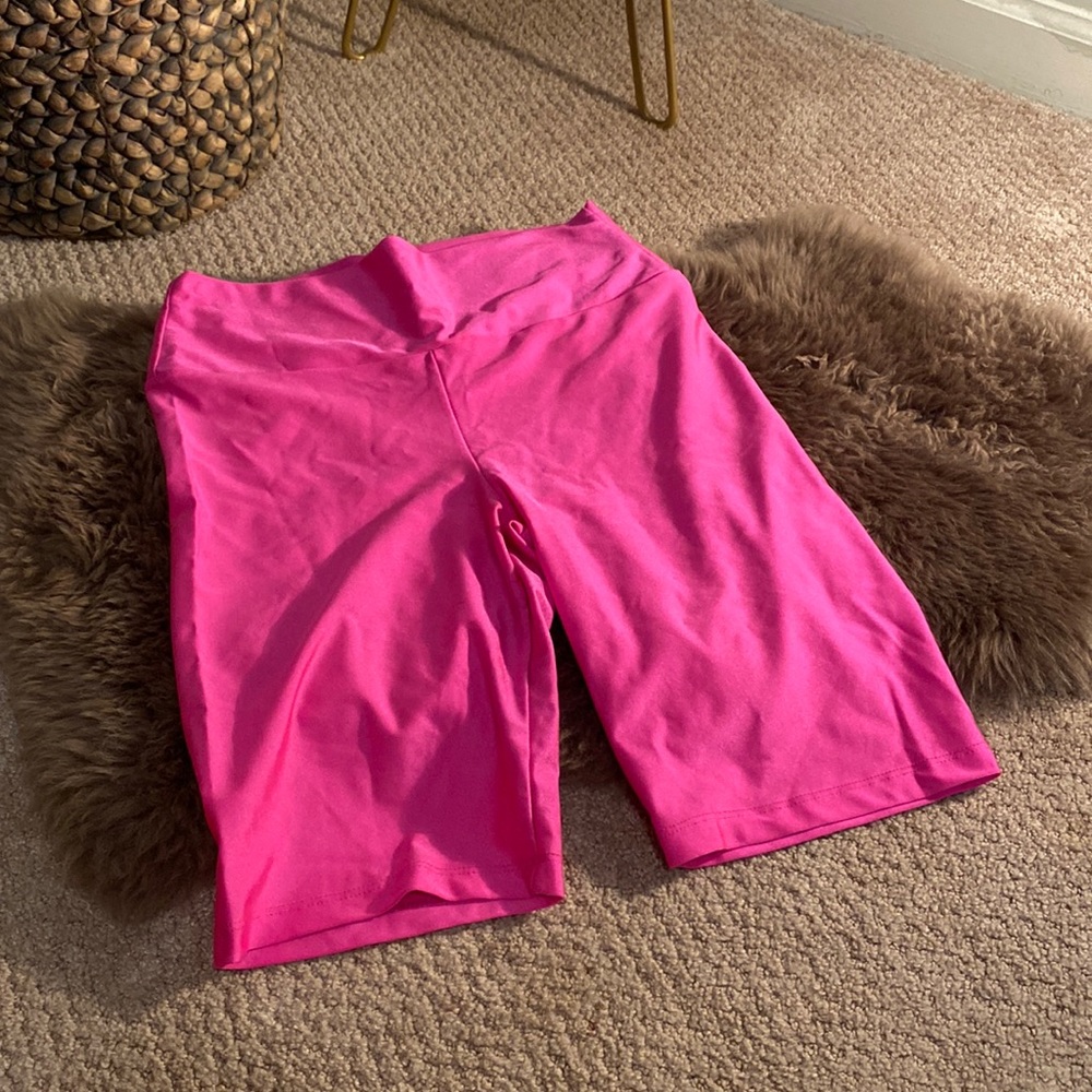 Fashion nova pink biker shorts.